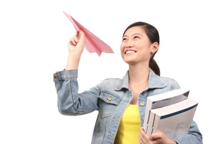 Smiling student - Advantages of Studying Abroad or Overseas Education